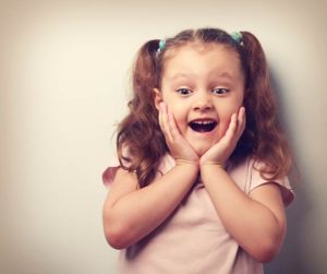 girl excited by gluten free food